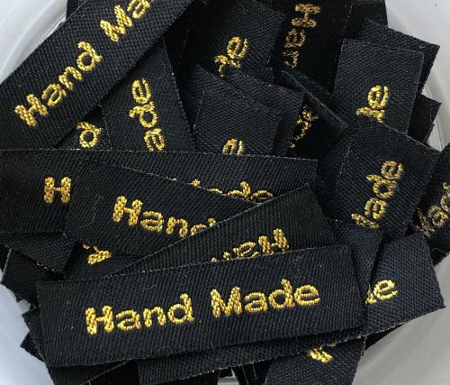 Sort med gull «hand made»