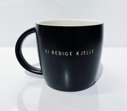 Sunnmørskoppen Ei redige kjelle