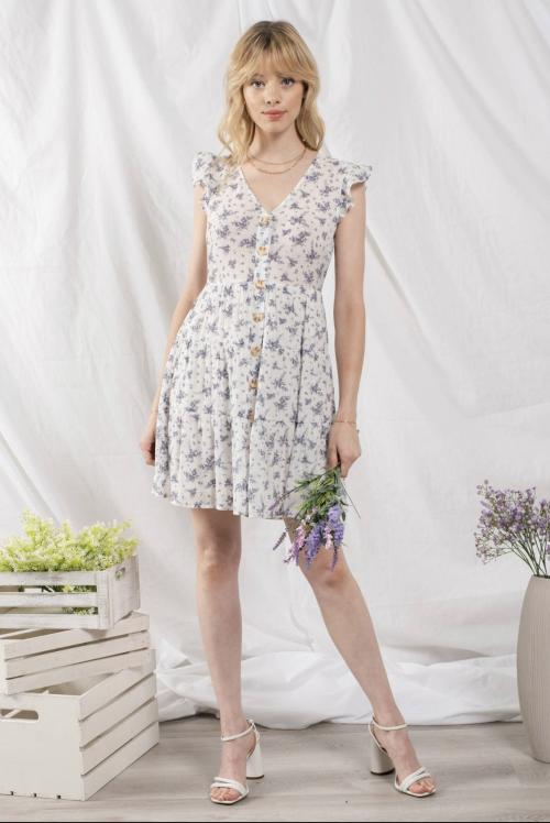 Hvit kjole med blå blomster