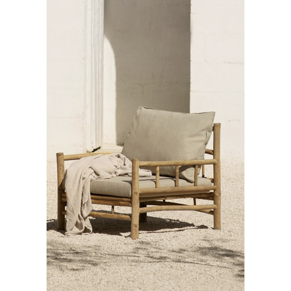 Lounge stol med beige pute