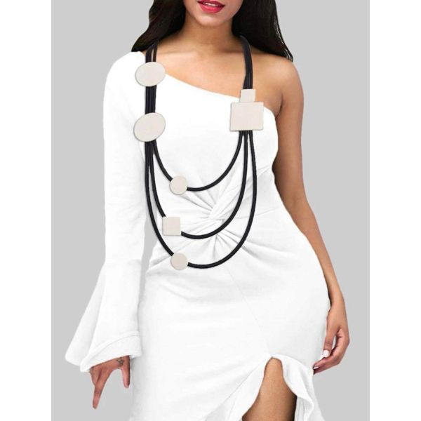 Sort smykke med offwhite detaljer