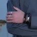 St&aring;l armb&aring;nd i svart flettet/glatt l&aelig;r - 8mm 